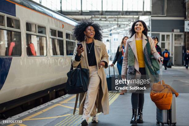 fashionable women ready to take newcastle by storm - spring arrival stock pictures, royalty-free photos & images