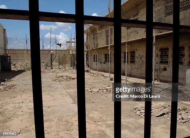 Empty cells are shown here April 17, 2003 inside the Abu Ghraib Prison, 10 km. West of Baghdad, Iraq. After years of rumors of atrocities said to...