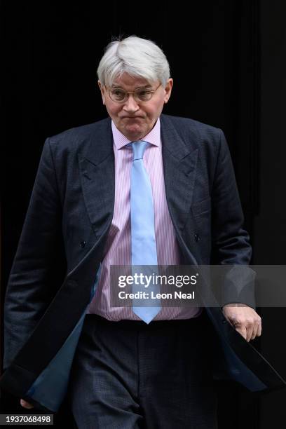 Foreign, Commonwealth and Development Secretary Andrew Mitchell leaves number 10, Downing Street, following the weekly Cabinet meeting on January 16,...