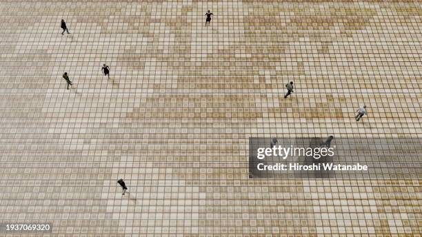 people walking on a world map made of binary codes, digitally generated image - augmented world stock pictures, royalty-free photos & images