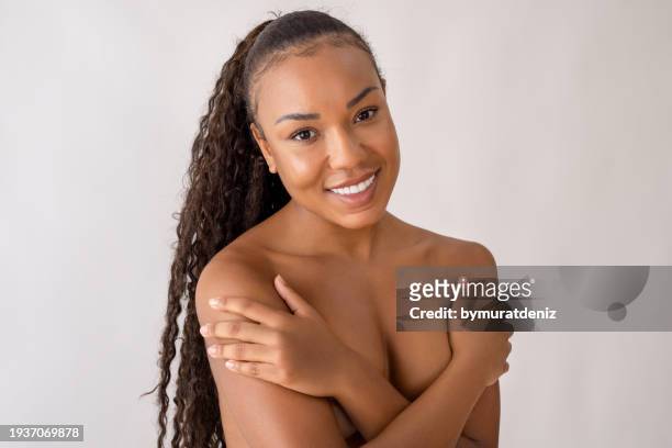 young latin woman with clean and fresh skin - perfect female body shape stock pictures, royalty-free photos & images