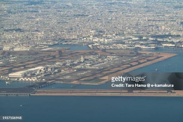 tokyo haneda international airport in tokyo of japan aerial view from airplane - tokyo international airport stockfoto's en -beelden