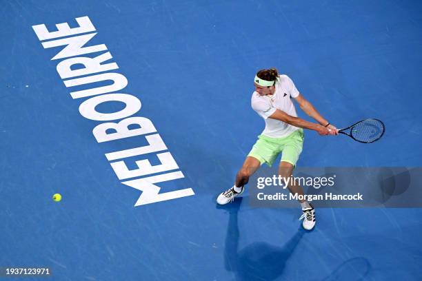 Alexander Zverev of Germany plays a backhand in their round one singles match against Dominik Koepfer of Germany during the 2024 Australian Open at...