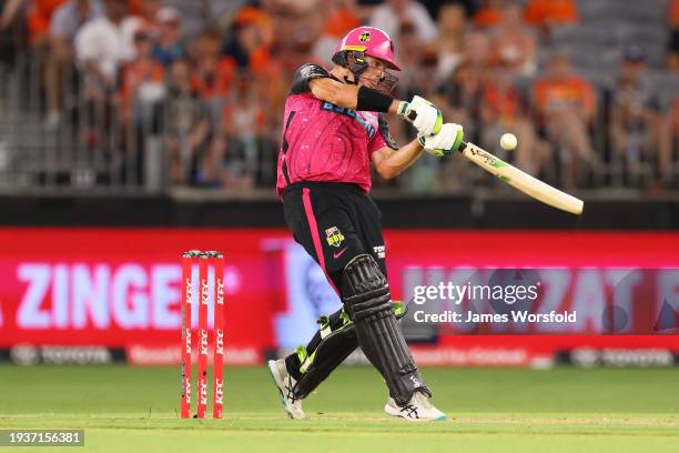 Daniel Hughes of the Sixers plays his shot during the BBL match between Perth Scorchers and Sydney Sixers at Optus Stadium, on January 16 in Perth,...