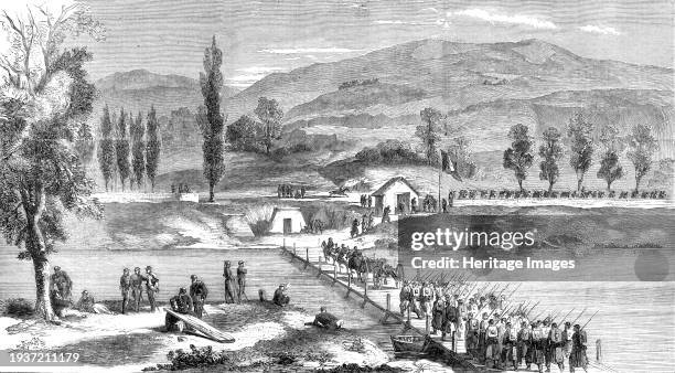 The War in Naples - Garibaldian troops crossing the Volturno - from a sketch by our special artist, Frank Vizetelly, 1860. 'Colin Dowling, assisted...