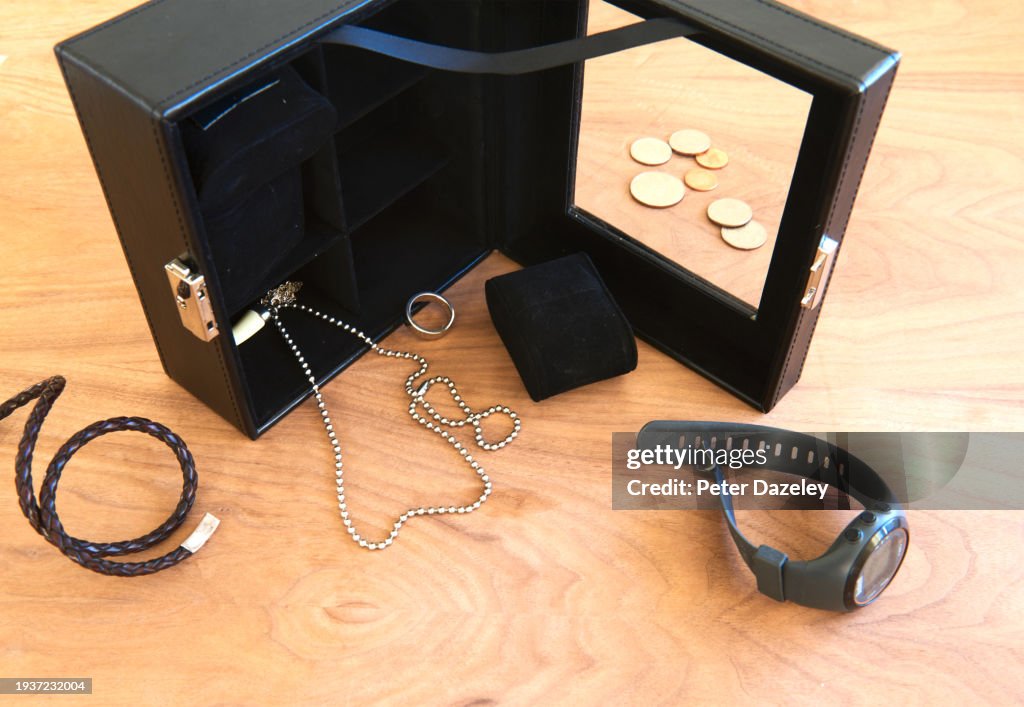 Bedroom after burglary, jewellery box on side