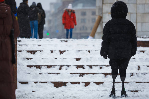 An activist with prosthetic legs demands the exchange of Ukrainian prisoners of war from Russian captivity during the rally on January 14, 2024 in...