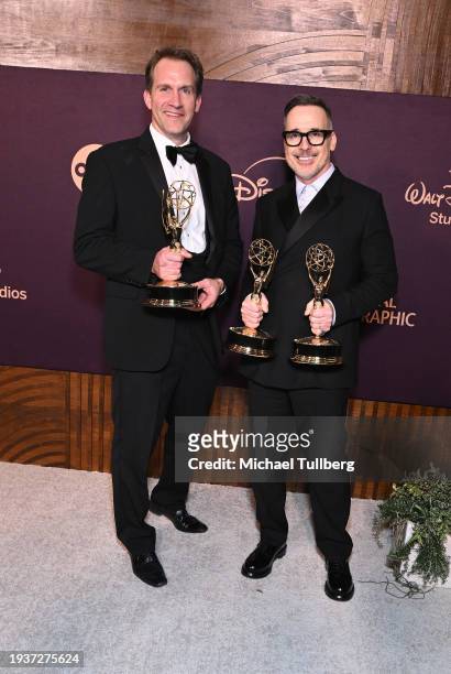 Luke Lloyd Davies and David Furnish attend The Walt Disney Company Emmy Awards Party at Otium on January 15, 2024 in Los Angeles, California.