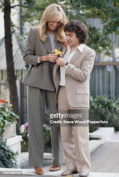 English comedian and actor Dudley Moore with American actress and singer Susan Anton in London, England, circa 1980.