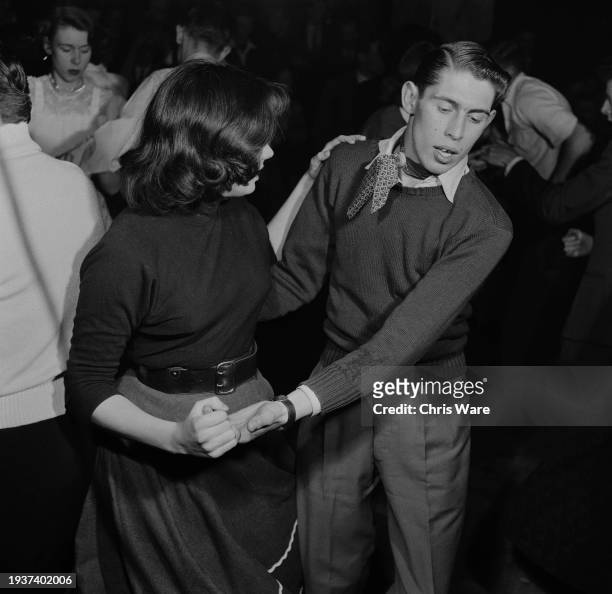 Couple dancing on the dancefloor of the Feldman Swing Club on Oxford Street, in the West End of London, England, May 1954. The club would later...