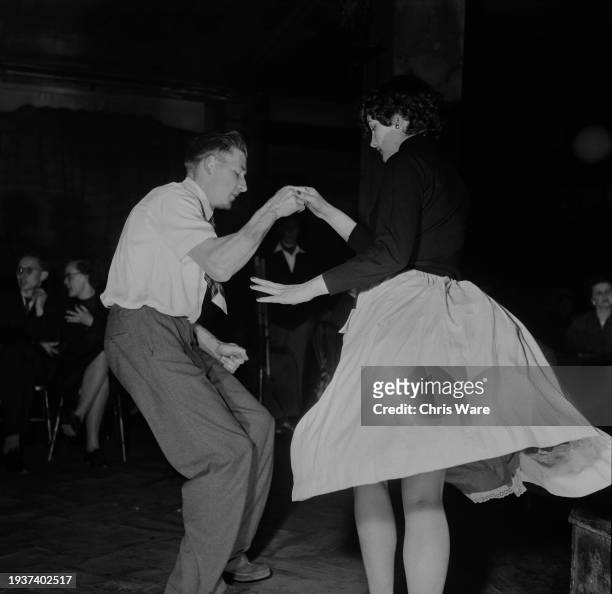 Couple dancing on the dancefloor of the Feldman Swing Club on Oxford Street, in the West End of London, England, May 1954. The club would later...