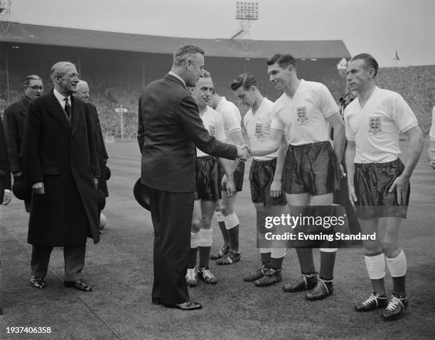 Earl Mountbatten meeting players of the England national football team ahead of a World Cup qualifying match against Ireland at Wembley Stadium,...