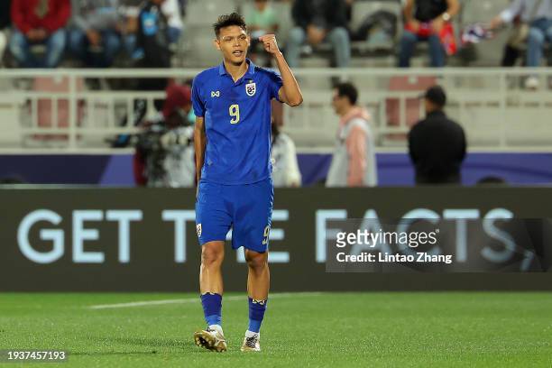 Supachai Chaided of Thailand celebrates scoring the opening goal during the AFC Asian Cup Group F match between Thailand and Kyrgyzstan at Abdullah...