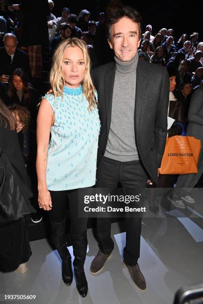 Kate Moss and Antoine Arnault attend the Dior Homme front row during Paris Fashion Week Menswear Fall/Winter 2024-2025 at Ecole Militaire on January...