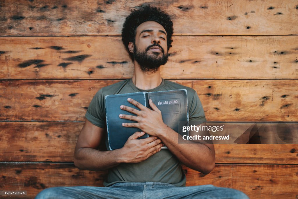Young man with the bible