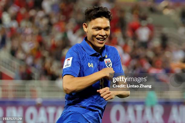 Supachai Chaided of Thailand celebrates scoring their second goal during the AFC Asian Cup Group F match between Thailand and Kyrgyzstan at Abdullah...