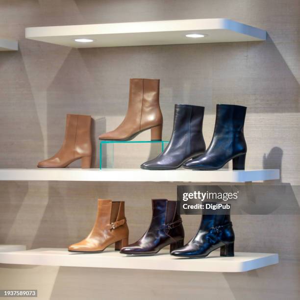 chic collection of ankle boots on display - shoe collection stockfoto's en -beelden