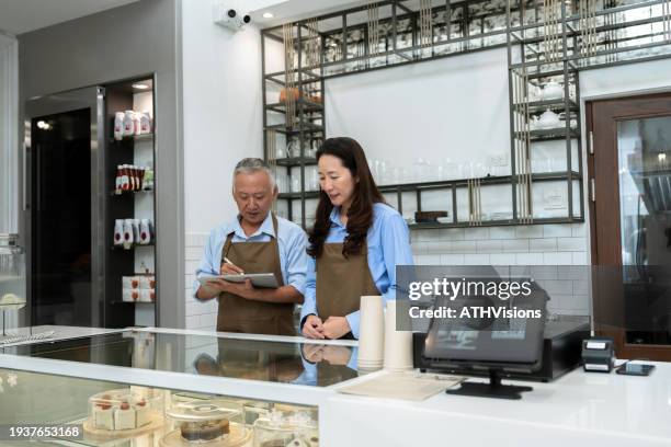 cafe ownership unveiled: senior couple's journey of quality control and customer satisfaction - cashflow stock pictures, royalty-free photos & images