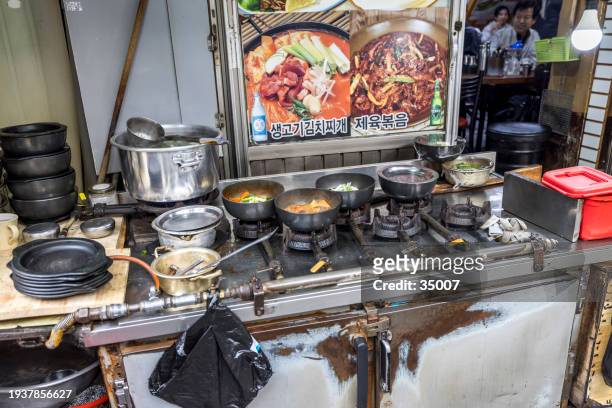 kwangjang food market in seoul - basil sellers stock pictures, royalty-free photos & images