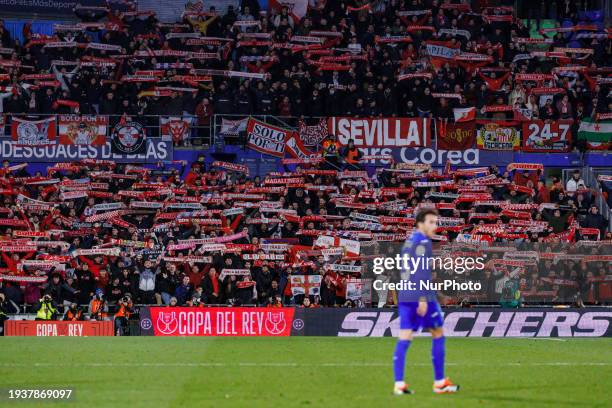 Fans of Sevilla FC are cheering during the La Copa del Rey match between Getafe and Sevilla at Estadio Coliseum in Madrid, Spain, on January 16, 2024.