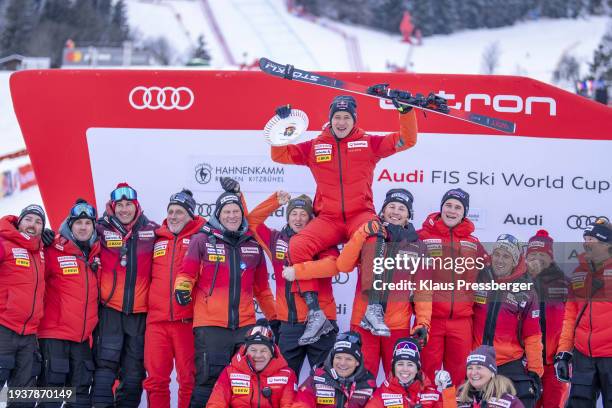 Marco Odermatt of Switzerland with team during Audi FIS Alpine Ski World Cup - Men's Downhill Hahnenkamm on January 19, 2024 in Kitzbuehel, Tyrol.