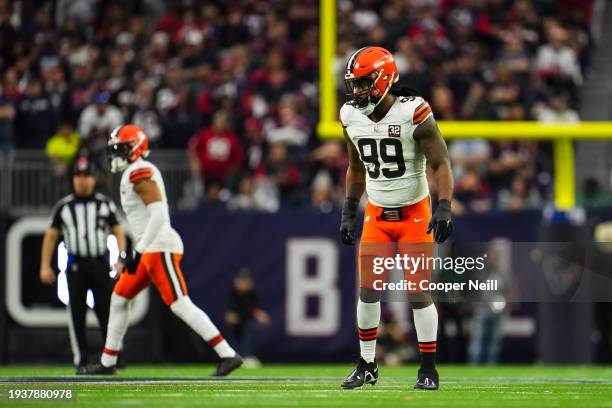 Za'Darius Smith of the Cleveland Browns looks on from the field during an NFL wild-card playoff football game against the Houston Texans at NRG...
