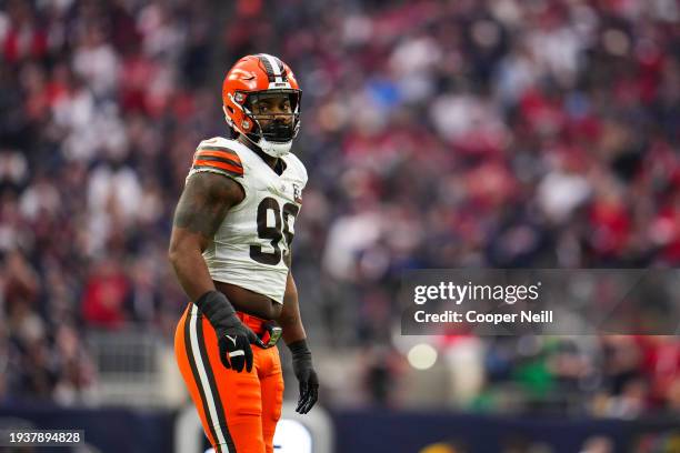 Za'Darius Smith of the Cleveland Browns looks on from the field during an NFL wild-card playoff football game against the Houston Texans at NRG...