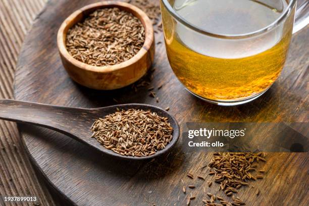 caraway seeds and tea - cominho imagens e fotografias de stock