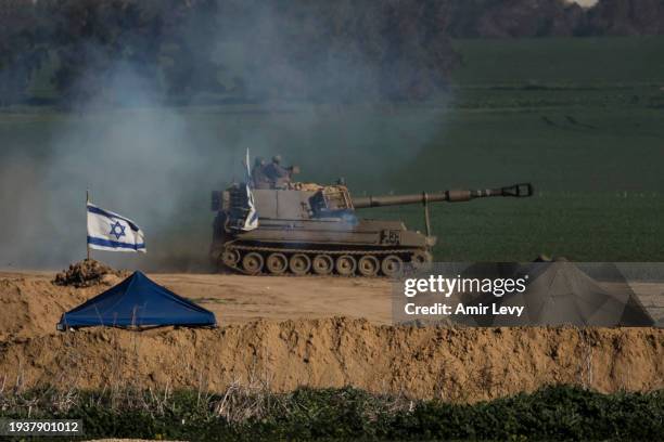 An Israeli artillery unit moves along the border with the Gaza Strip on January 19, 2024 in Southern Israel, Israel. Israel increased air raids in...