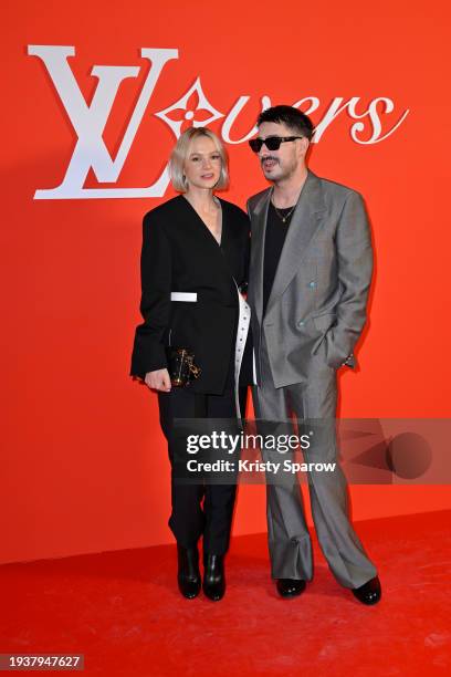 Carey Mulligan and Marcus Mumford attend the Louis Vuitton Menswear Fall/Winter 2024-2025 show as part of Paris Fashion Week on January 16, 2024 in...