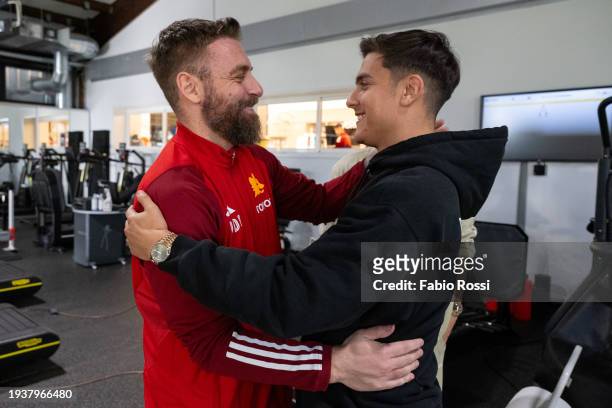 Daniele De Rossi meets Paulo Dybala during his first day as AS Roma coach at Centro Sportivo Fulvio Bernardini on January 16, 2024 in Rome, Italy.