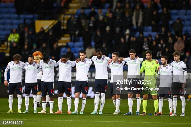 Players, match officials and fans take part in a minute's silence in remembrance of Iain Purslow prior to during the Emirates FA Cup Third Round...