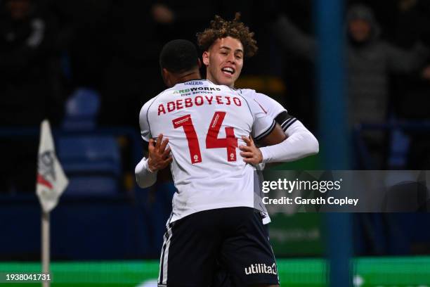 Dion Charles of Bolton Wanderers celebrates scoring his team's first goal with teammate Victor Adeboyejo of Bolton Wanderers during the Emirates FA...