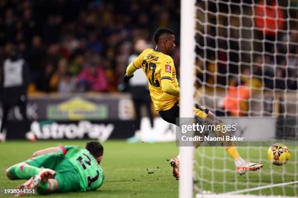 Nelson Semedo of Wolverhampton Wanderers scores his team's first goal during the Emirates FA Cup Third Round Replay match between Wolverhampton...