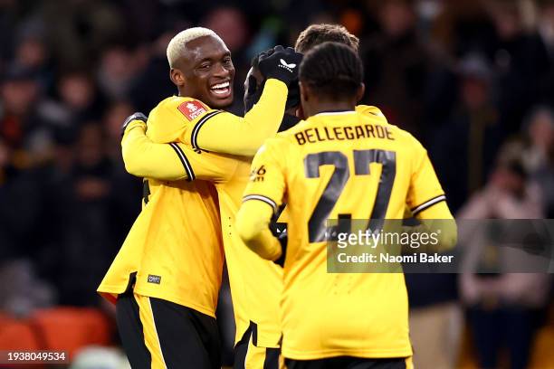 Nelson Semedo of Wolverhampton Wanderers celebrates with teammates after scoring his team's first goal during the Emirates FA Cup Third Round Replay...