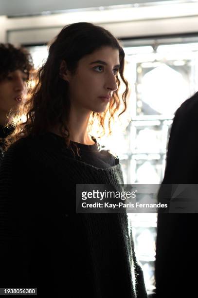 Model Alexandra Steain waits backstage prior to the Burc Akyol Menswear Fall/Winter 2024-2025 show as part of Paris Fashion Week on January 16, 2024...