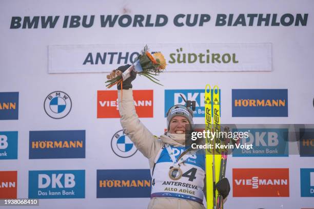 Lena Haecki-Gross of Switzerland celebrates at the medal ceremony for winning the Women 12.5km Short Individual at the BMW IBU World Cup Biathlon...