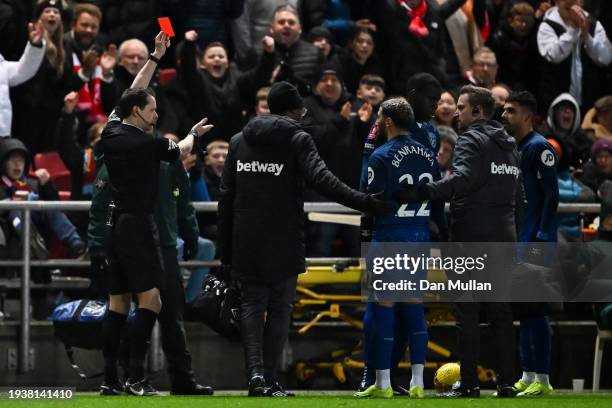 Referee Darren England gives a red card to Said Benrahma of West Ham United during the Emirates FA Cup Third Round Replay match between Bristol City...