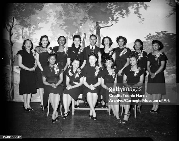Members of Pastor's Aid Committee at Wesley Center AMEZ Church, posed in A Leo Weil school, Pittsburgh, Pennsylvania, ca 1946. Pictured are back row,...