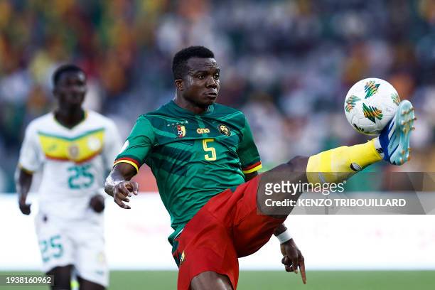 Cameroon's defender Nouhou Tolo controls the ball during the Africa Cup of Nations 2024 group C football match between Senegal and Cameroon at the...