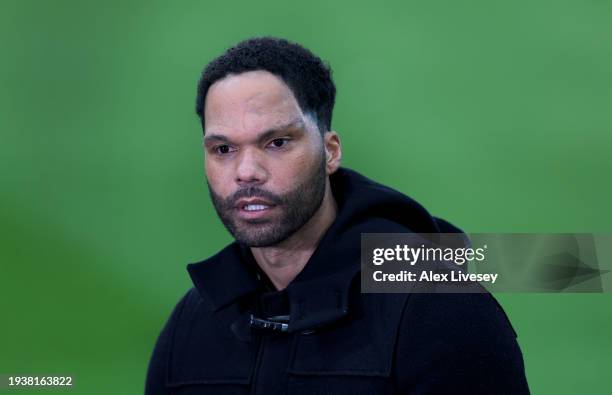 Joleon Lescott, TNT Sports Pundit, looks on prior to the Premier League match between Newcastle United and Manchester City at St. James Park on...