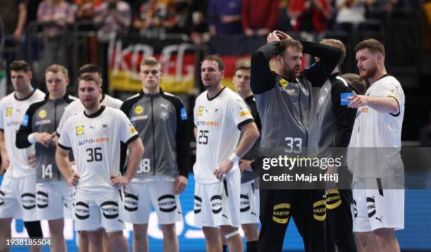 Andreas Wolff of Germany looks dejected after the Men's EHF Euro 2024 preliminary round match between France and Germany at Mercedes-Benz Arena on...