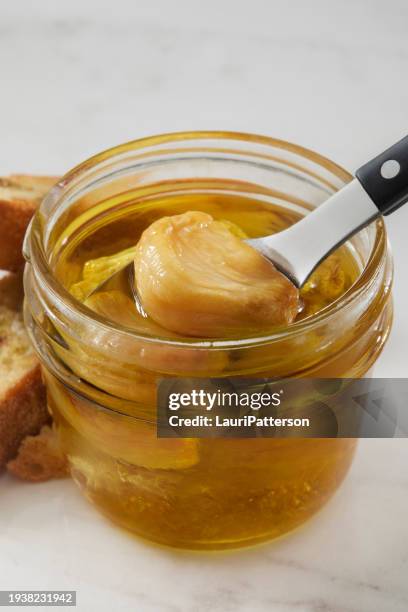 garlic confit - confit stock pictures, royalty-free photos & images