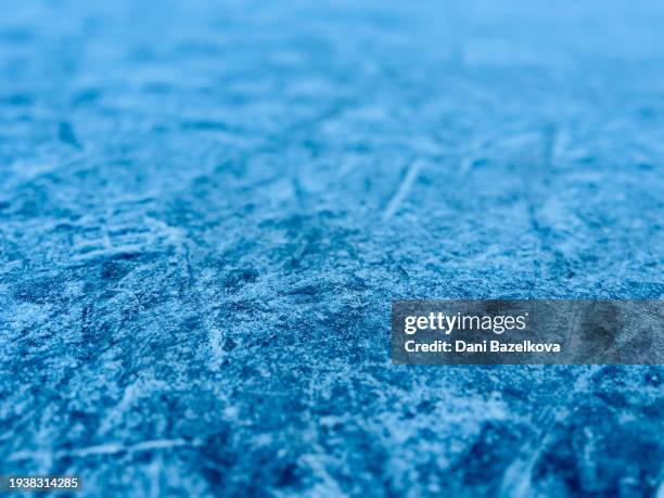 full frame of an ice rink surface - hockey ice stock pictures, royalty-free photos & images