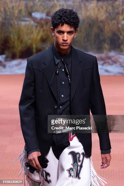 Model walks the runway during the Louis Vuitton Menswear Fall/Winter 2024-2025 show as part of Paris Fashion Week on January 16, 2024 in Paris,...