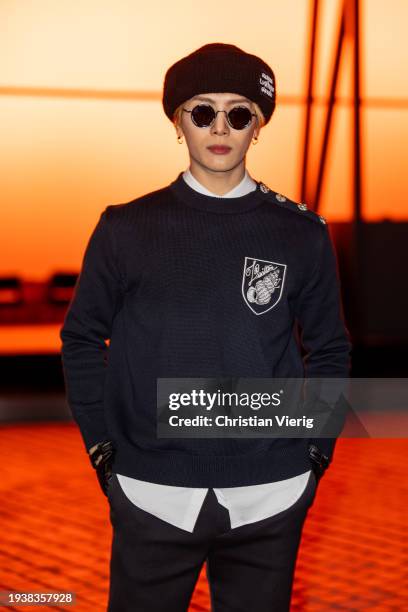 Jackson Wang is seen wearing hat, black jumper, pants, sunglasses outside Louis Vuitton during the Menswear Fall/Winter 2024/2025 as part of Paris...