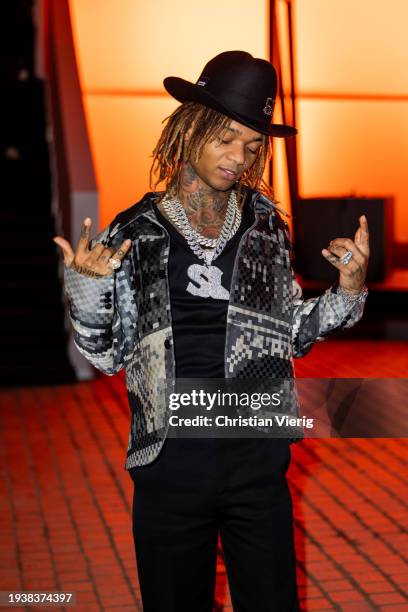 Swae Lee is seen wearing jacket, black white jacket outside Louis Vuitton during the Menswear Fall/Winter 2024/2025 as part of Paris Fashion Week on...