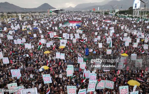 Hundreds of thousands of Yemeni people, holding banners and Palestinian flags, gather at Sebin Street after Friday prayers to protest against the US...