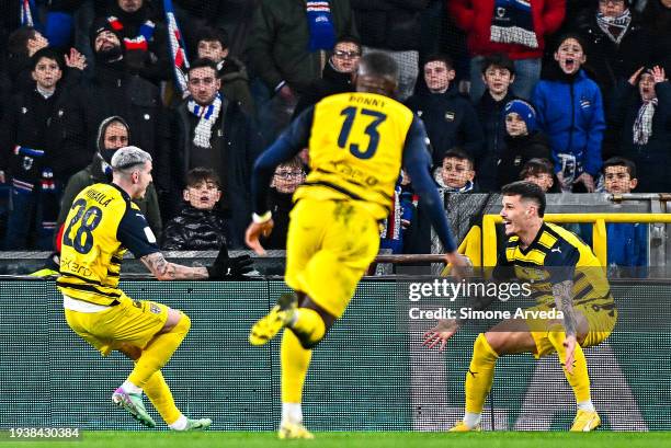 Valentin Mihaila of Parma celebrates with his team-mate Dennis Man after scoring a goal during the Serie B match between UC Sampdoria and Parma...