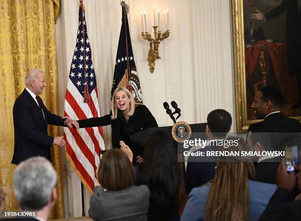 President Joe Biden is greeted by Hillary Shieve, mayor of Reno, Nevada, before addressing mayors attending the US Conference of Mayors Winter...